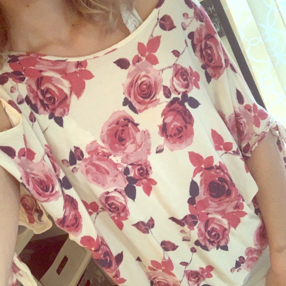 Super cute tie cut out shoulder blouse.